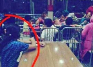 Babá ficou totalmente isolada em restaurante enquanto a família comia em outra mesa