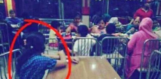 Babá ficou totalmente isolada em restaurante enquanto a família comia em outra mesa