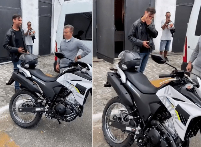 Motoboy que levou no colo mulher desconhecida na chuva ganha moto nova de presente sensivel-mente.com - Motoboy que levou no colo mulher desconhecida na chuva ganha moto nova de presente