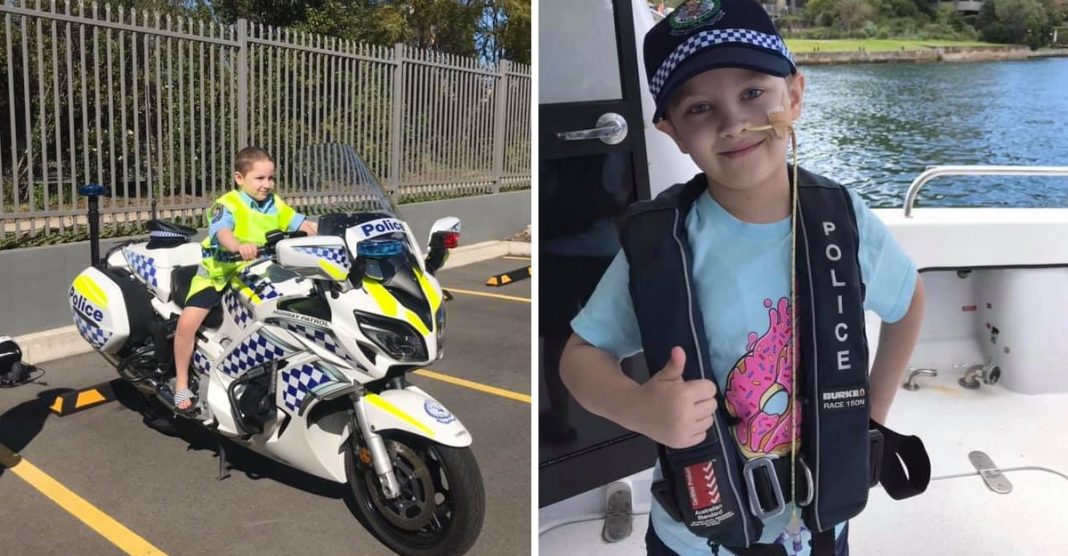 Criança com câncer terminal foi policial por um dia como sempre sonhou. Eles são seus heróis