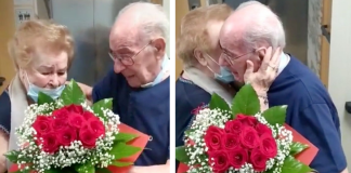Casal se abraça em lágrimas após 9 meses de separação.